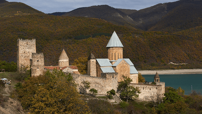 Text “Ananuri Fortress Complex in Georgia”